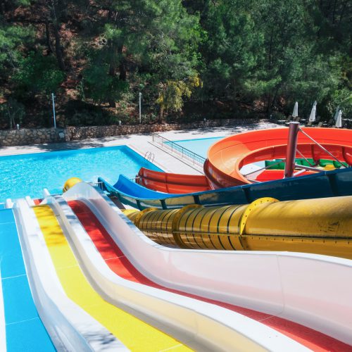 colorful aquapark in green forest